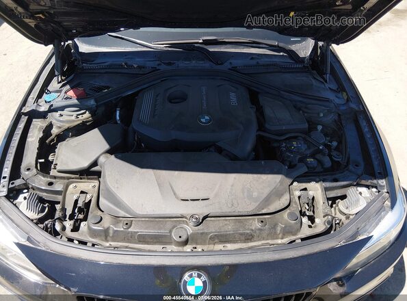 WBA4W3C52KAF91714 2019 BMW 4 SERIES Black Rear view
