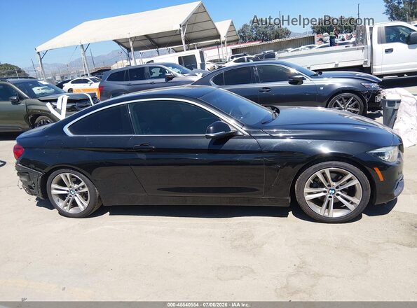 WBA4W3C52KAF91714 2019 BMW 4 SERIES Black Rear interior view