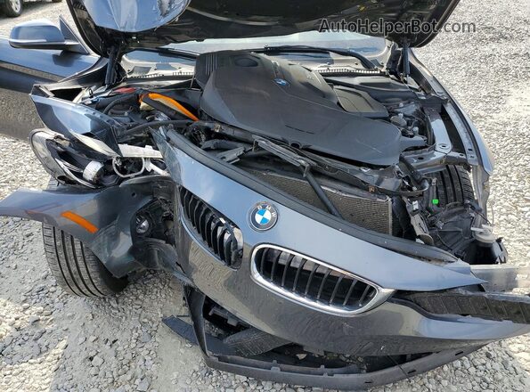 WBA4W5C59JAD32759 2018 BMW 4 SERIES Charcoal Widok wnętrza z tyłu