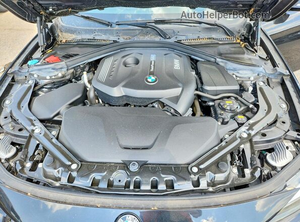 WBA4Z3C56KEF31435 2019 BMW 4 SERIES Black Rear interior view