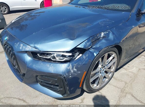 WBA53AP06MCF61526 2021 BMW 4 SERIES Blue Vista frontal