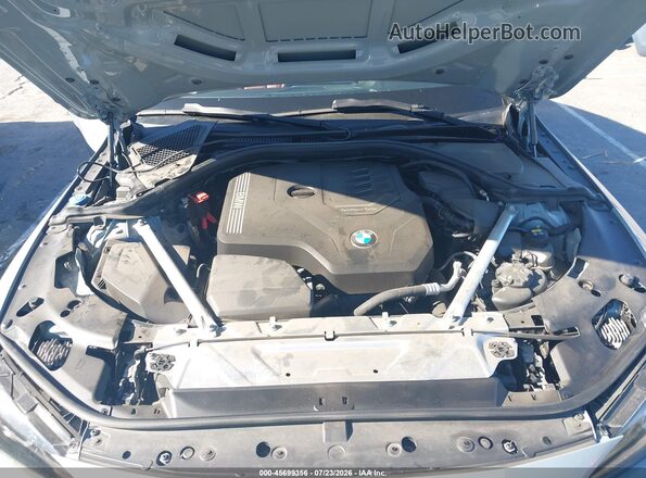 WBA53AP08NCJ66908 2022 BMW 4 SERIES Light Blue Vista trasera