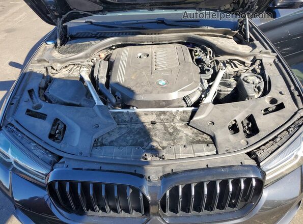 WBA53BJ06PCL82368 2023 BMW 5 SERIES Black Rear interior view