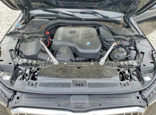 WBA53FJ05RCP81282 2024 BMW 5 SERIES Black Вид задньої частини салону