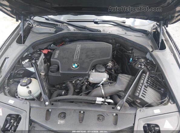 WBA5A5C59GG347140 2016 BMW 5 SERIES Gray Rear view