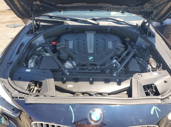 WBA5M0C33HD085319 2017 BMW 5 SERIES Black Vista interior trasera