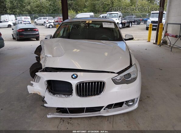 WBA5M2C51GGH99365 2016 BMW 5 SERIES White Widok wnętrza z tyłu