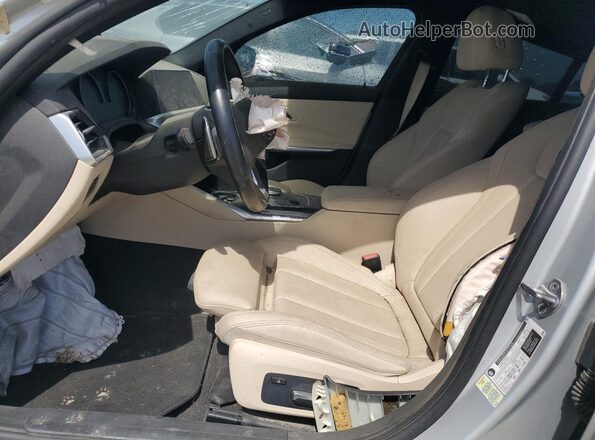 WBA5R1C52KAJ98549 2019 BMW 3 SERIES Silver Front interior view
