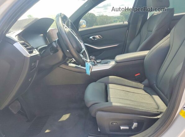WBA5R1C56KAK11934 2019 BMW 3 SERIES Silver Front interior view