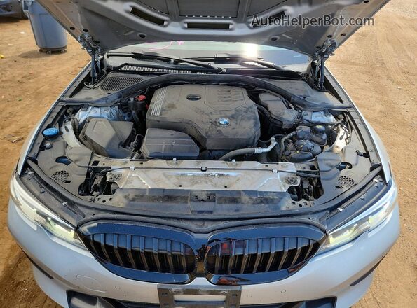 WBA5R7C06LFH46325 2020 BMW 3 SERIES Silver Vista interior trasera