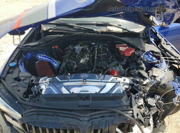 WBA5U7C04LFH46757 2020 BMW M3 Синий Вид задней части салона