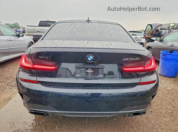 WBA5U9C05NFL90119 2022 BMW M3 Black Vista trasera