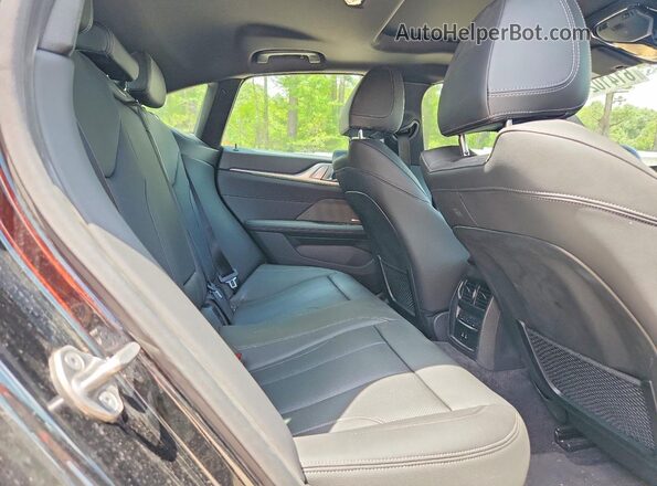 WBA63AV02RFP77707 2024 BMW 4 SERIES Black Вид задніх сидінь