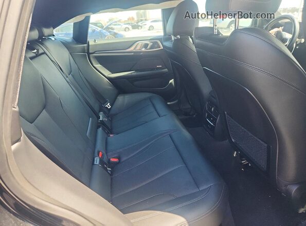 WBA63AV07RFR33580 2024 BMW 4 SERIES Black Rear seats view