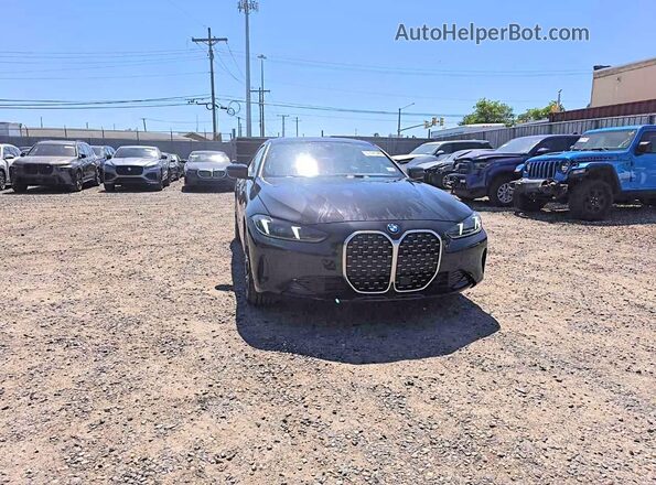 WBA63DA01TCU91170 2026 BMW 4 SERIES Черный Задняя правая четверть