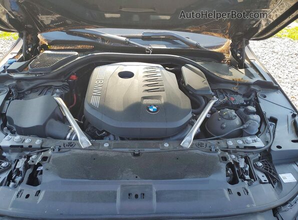 WBA63FJ00SCT50133 2025 BMW 5 SERIES Черный Вид задней части салона