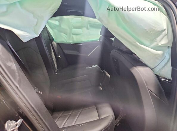 WBA63FJ05RCS51009 2024 BMW 5 SERIES Black უკანა სალონის ხედი