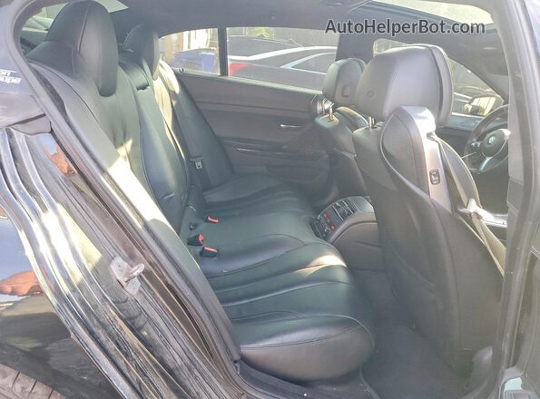 WBA6D6C50JG388877 2018 BMW ALPINA Black Vista de los asientos traseros