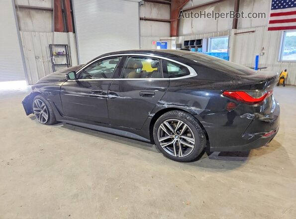 WBA73AV05RFP69749 2024 BMW 4 SERIES Black Trasero izquierdo