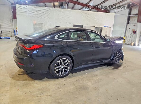 WBA73AV05RFP69749 2024 BMW 4 SERIES Black Trasero derecho