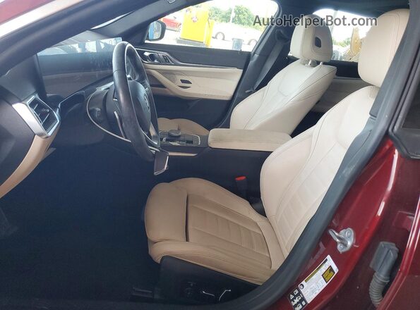 WBA73AV09RFS17378 2024 BMW 4 SERIES Burgundy Widok wnętrza z przodu