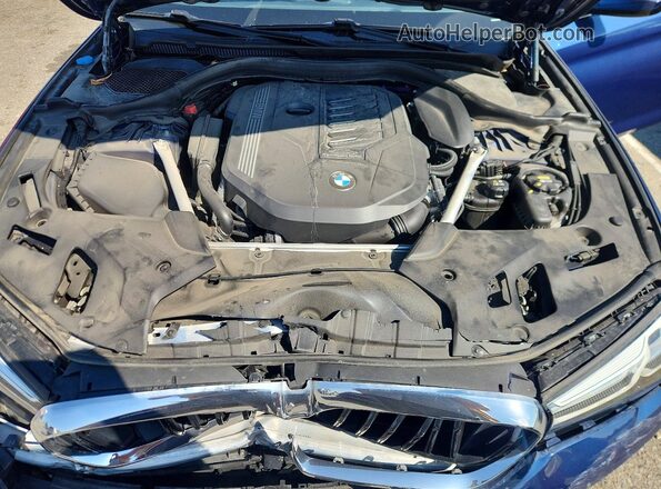 WBA73BJ01PWY13321 2023 BMW 5 SERIES Синий Вид задней части салона