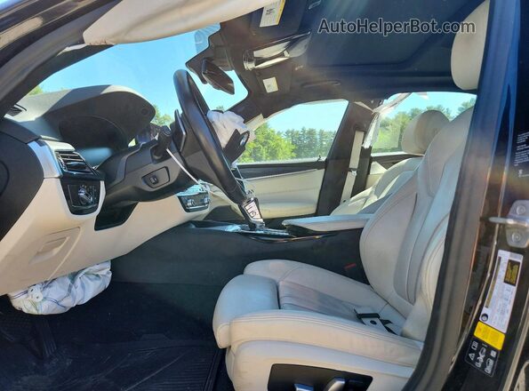 WBA73BJ07MWW94301 2021 BMW 5 SERIES Черный Вид салона спереди