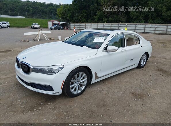WBA7E2C50HG740411 2017 BMW 7 SERIES White წინა მარცხენა ხედი სამი მეოთხედიდან