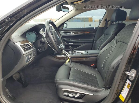 WBA7E2C52GG738741 2016 BMW 7 SERIES Черный Вид салона спереди