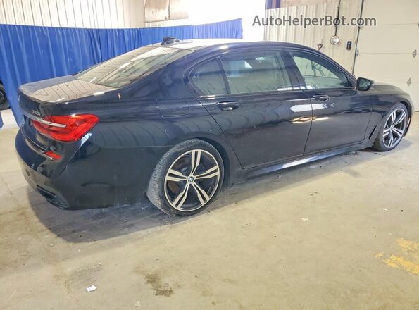 WBA7E2C58GG548104 2016 BMW 7 SERIES Blue Trasero derecho