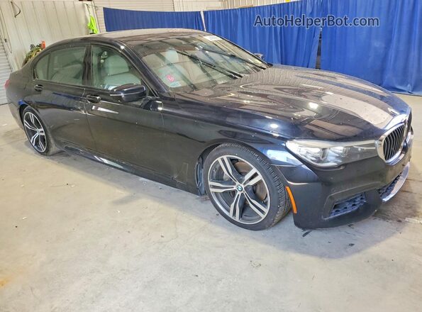 WBA7E2C58GG548104 2016 BMW 7 SERIES Blue Delantero derecho