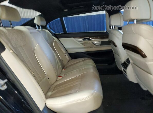 WBA7E2C58GG548104 2016 BMW 7 SERIES Blue Vista de los asientos traseros