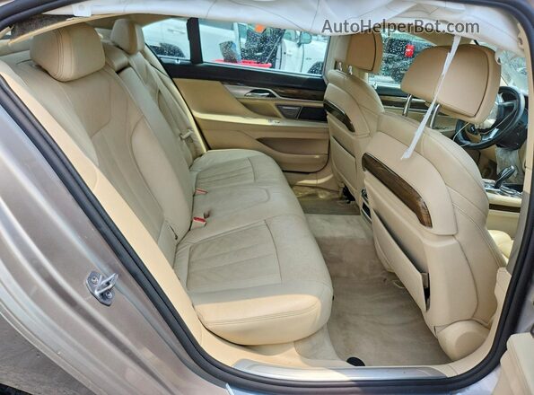 WBA7E2C59GG547835 2016 BMW 7 SERIES Cream უკანა სავარძლების ხედი