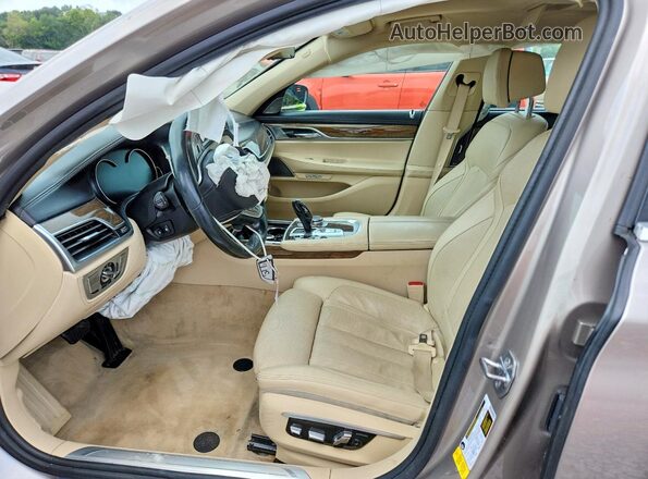 WBA7E2C59GG547835 2016 BMW 7 SERIES Cream წინა სალონის ხედი