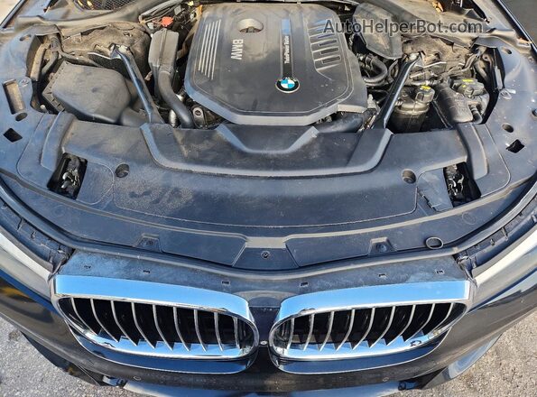 WBA7E2C5XJG742270 2018 BMW 7 SERIES Black Вид задньої частини салону