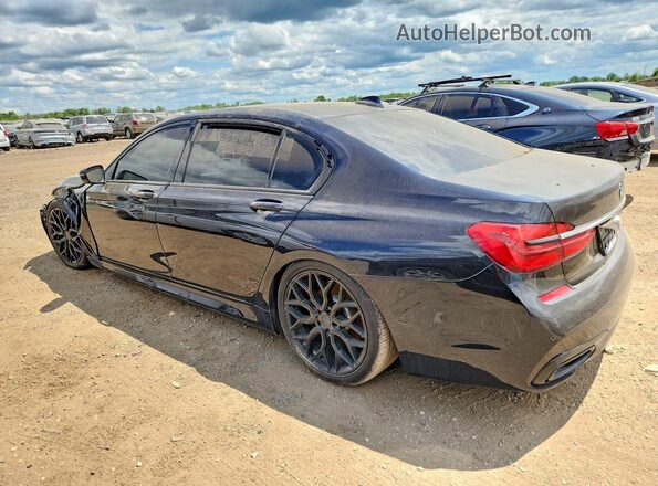 WBA7E4C57HGU99328 2017 BMW 7 SERIES Black Tył lewy