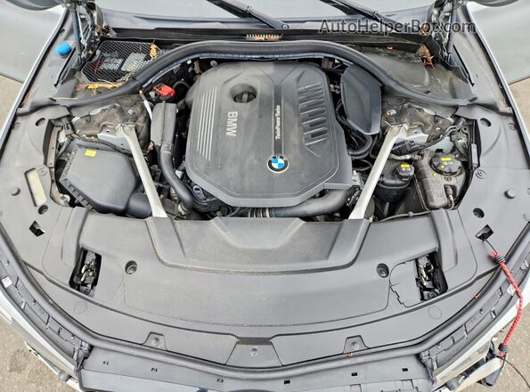 WBA7E4C59JGV28091 2018 BMW 7 SERIES Silver Vista interior trasera