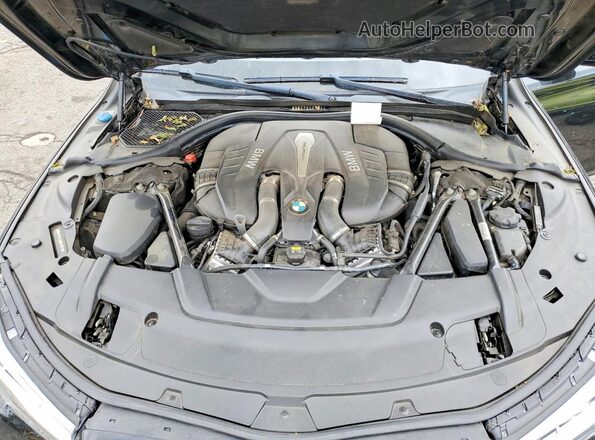 WBA7F0C32HGM21673 2017 BMW 7 SERIES Black უკანა სალონის ხედი