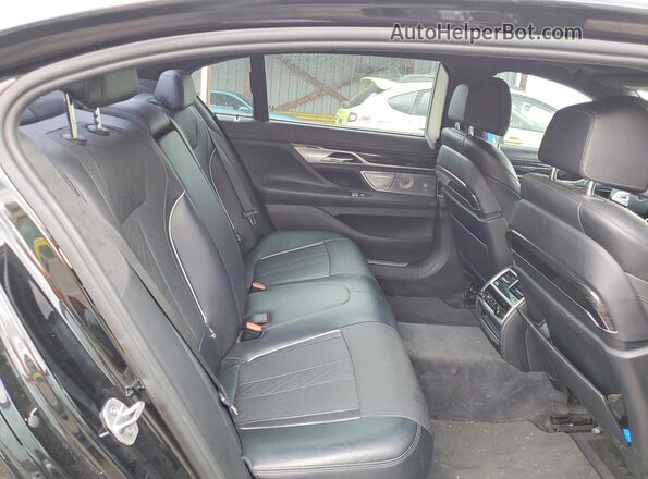 WBA7F0C32HGM21673 2017 BMW 7 SERIES Black უკანა სავარძლების ხედი