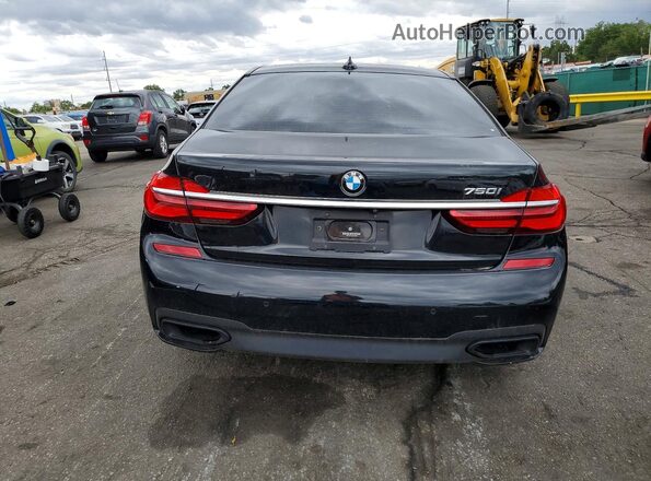 WBA7F0C32HGM21673 2017 BMW 7 SERIES Black უკანა ხედი