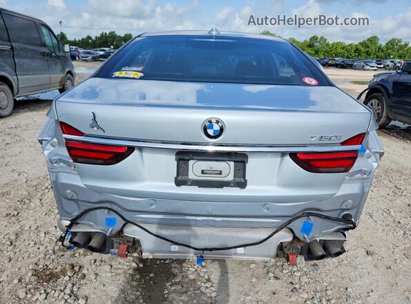 WBA7F0C50KGM25469 2019 BMW 7 SERIES Серебряный Вид сзади