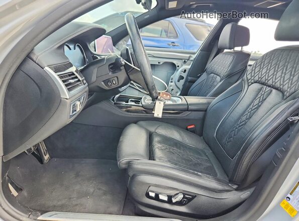 WBA7F0C50KGM25469 2019 BMW 7 SERIES Серебряный Вид салона спереди