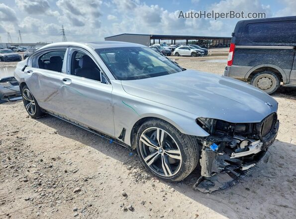 WBA7F0C50KGM25469 2019 BMW 7 SERIES Серебряный Передняя правая четверть