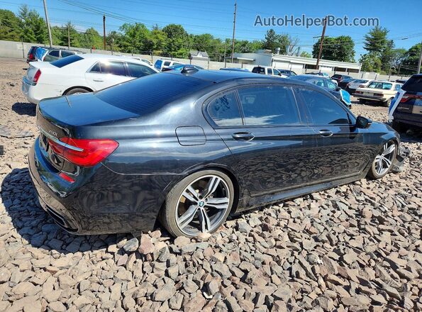 WBA7F0C51GGM20854 2016 BMW 7 SERIES Черный Задняя правая четверть