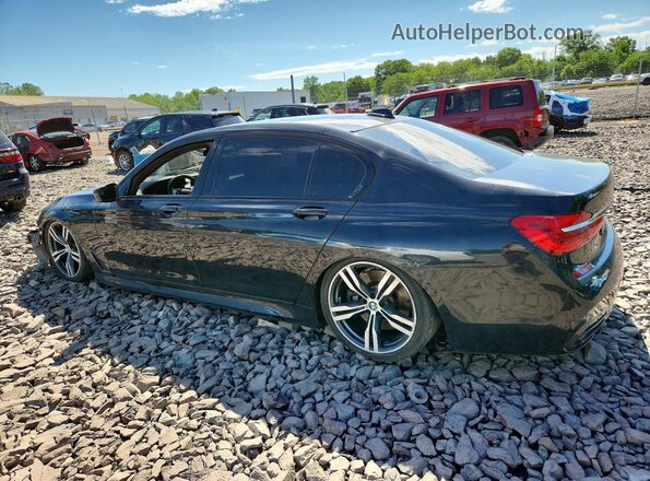 WBA7F0C51GGM20854 2016 BMW 7 SERIES Черный Задняя левая четверть