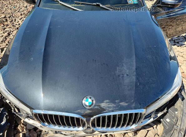 WBA7F0C51GGM20854 2016 BMW 7 SERIES Черный Вид задней части салона