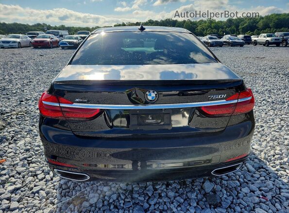 WBA7F2C50GG418489 2016 BMW 7 SERIES Black Rear view