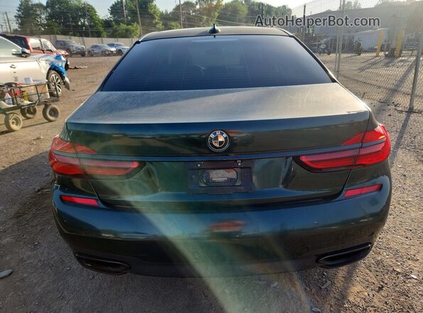 WBA7F2C50JB238725 2018 BMW 7 SERIES Green უკანა ხედი