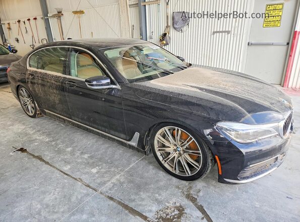 WBA7F2C51GG419523 2016 BMW 7 SERIES Черный Передняя правая четверть