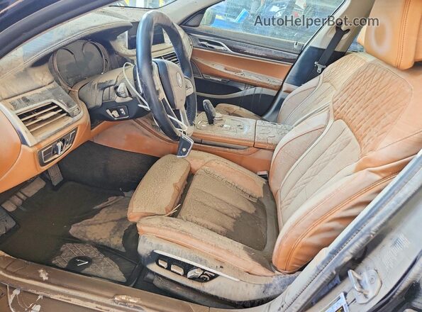 WBA7F2C51GG419523 2016 BMW 7 SERIES Черный Вид салона спереди